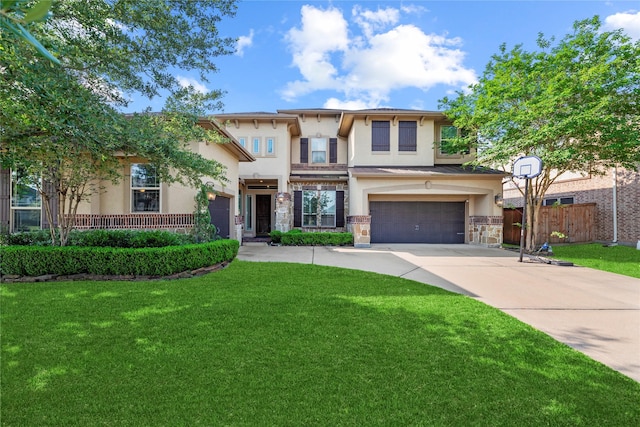 3310 Ralston Edge Ln, Houston, TX 77059 - view of front of house featuring stucco siding, driveway, an attached garage, and stone siding
