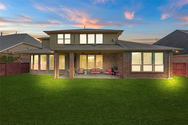 3310 Ralston Edge Ln, Houston, TX 77059 - rear view of property with a patio, brick siding, and stucco siding