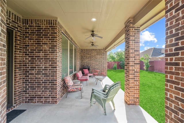 3310 Ralston Edge Ln, Houston, TX 77059 - fenced backyard with ceiling fan and a patio area