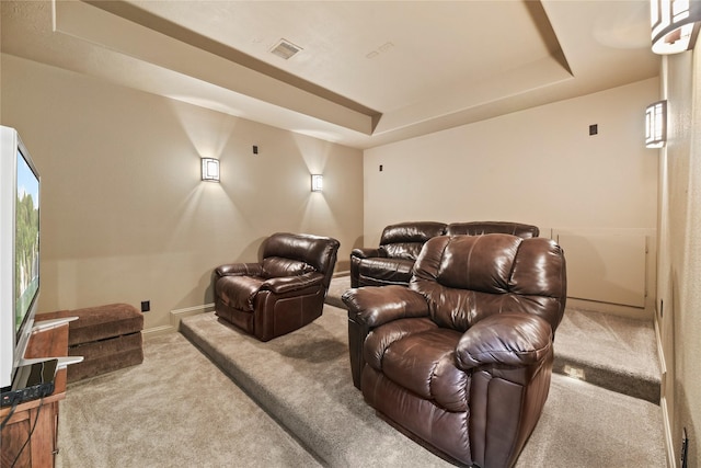 3310 Ralston Edge Ln, Houston, TX 77059 - cinema room featuring carpet flooring, a raised ceiling, and baseboards