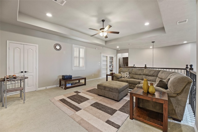 3310 Ralston Edge Ln, Houston, TX 77059 - living room with a tray ceiling, light colored carpet, ceiling fan, baseboards, and recessed lighting