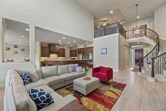 3310 Ralston Edge Ln, Houston, TX 77059 - living area featuring a high ceiling, recessed lighting, stairway, baseboards, and a ceiling fan