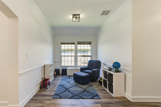 12006 Bright Landing Ct, Pearland, TX 77584 - living area featuring wood finished floors, ornamental molding, and baseboards