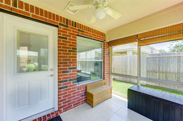 12006 Bright Landing Ct, Pearland, TX 77584 - sunroom with ceiling fan and radiator
