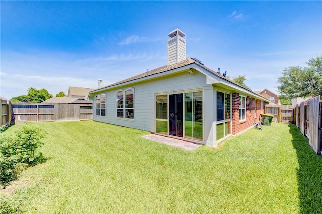 12006 Bright Landing Ct, Pearland, TX 77584 - rear view of property with a chimney