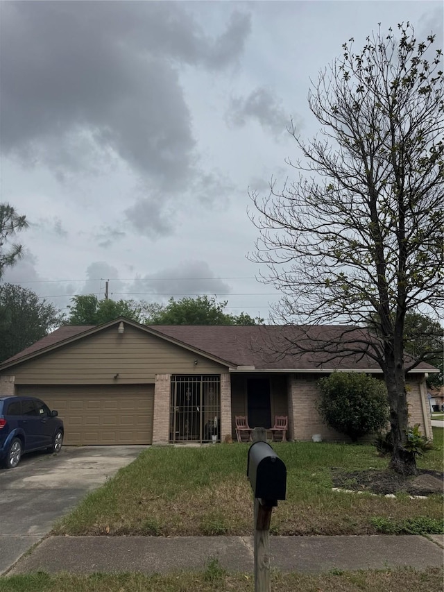 11902 Bremen Dr, Houston, TX 77066 - single story home with brick siding, an attached garage, and driveway