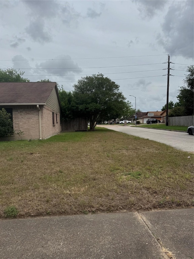 11902 Bremen Dr, Houston, TX 77066 - view of yard with concrete driveway
