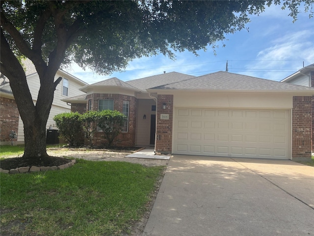 7415 Bering Landing Dr, Cypress, TX 77433 - view of front facade featuring brick siding, an attached garage, concrete driveway, and roof with shingles