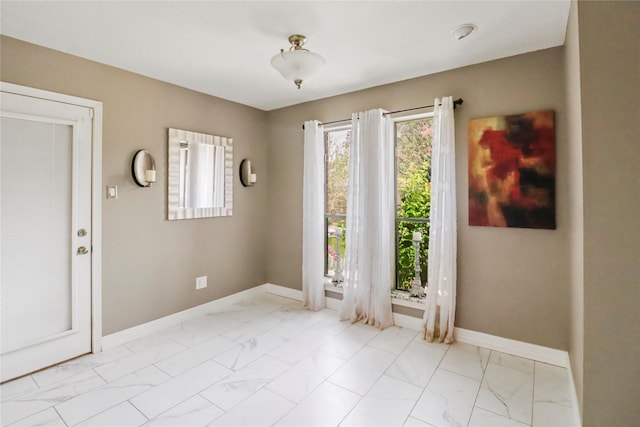 37 N Erik Dr, Angleton, TX 77515 - foyer entrance with light marble finish flooring and baseboards