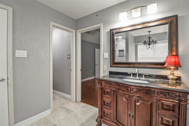 37 N Erik Dr, Angleton, TX 77515 - bathroom with vanity and a chandelier