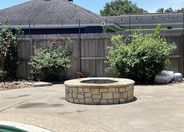 37 N Erik Dr, Angleton, TX 77515 - fenced backyard featuring a fire pit and a patio