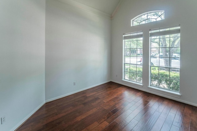 5407 Lake Place Dr, Houston, TX 77041 - empty room with ornamental molding, dark wood-style flooring, lofted ceiling, and baseboards