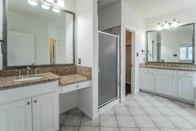5407 Lake Place Dr, Houston, TX 77041 - full bath with a shower stall, two vanities, tile patterned flooring, and a closet