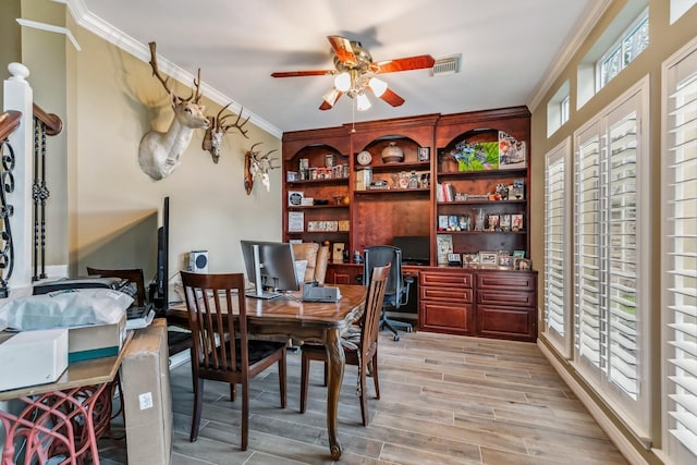 16342 Granite Park Ct, Cypress, TX 77429 - dining room with a ceiling fan, light wood-type flooring, crown molding, and a desk