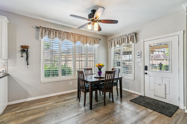 16342 Granite Park Ct, Cypress, TX 77429 - dining area featuring plenty of natural light, baseboards, and a ceiling fan