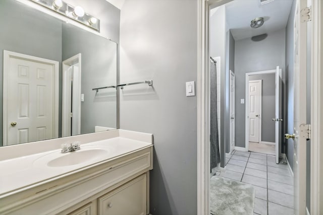 16342 Granite Park Ct, Cypress, TX 77429 - bathroom with tile patterned floors, vanity, a heating unit, baseboards, and a shower with shower curtain