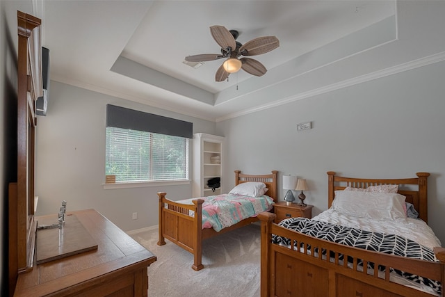 12214 Francel Ln, Cypress, TX 77429 - bedroom featuring a raised ceiling, light carpet, a ceiling fan, and ornamental molding