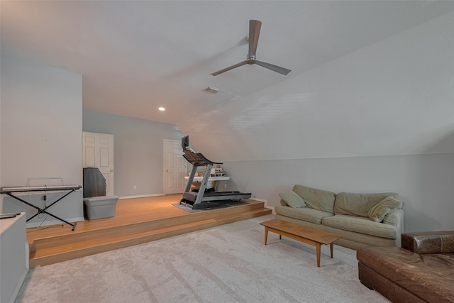 12214 Francel Ln, Cypress, TX 77429 - carpeted living room featuring a ceiling fan, recessed lighting, lofted ceiling, and wood finished floors