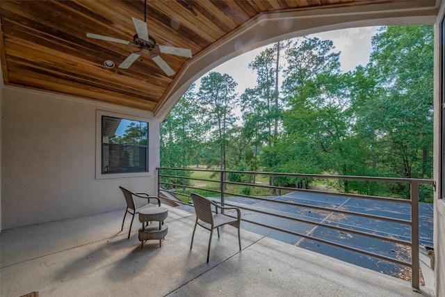 12214 Francel Ln, Cypress, TX 77429 - view of patio featuring a ceiling fan and view of wooded area