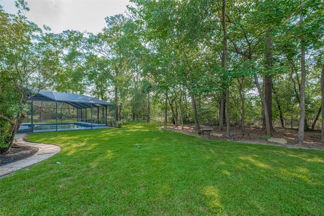 12214 Francel Ln, Cypress, TX 77429 - view of green lawn featuring a pool and glass enclosure