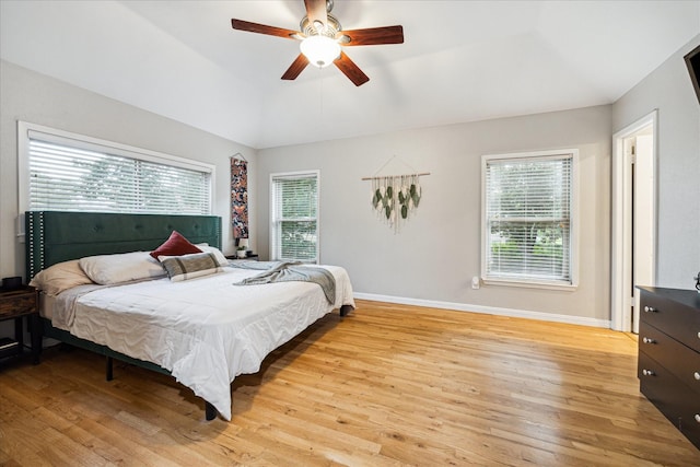 1510 Apple Park Dr, Katy, TX 77450 - bedroom featuring light wood-style floors, baseboards, vaulted ceiling, and ceiling fan