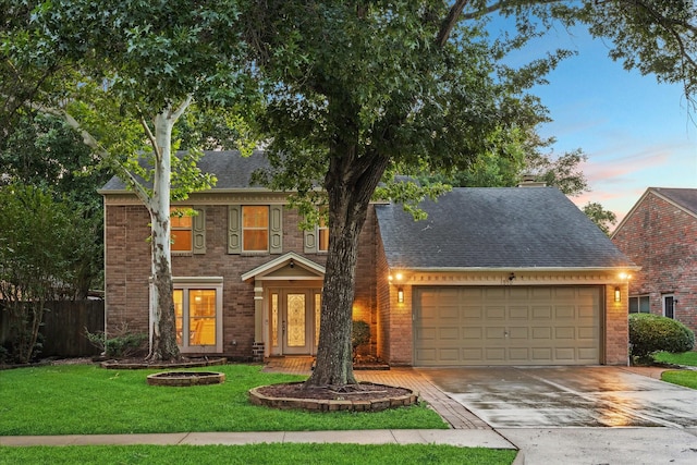 1510 Apple Park Dr, Katy, TX 77450 - view of front facade with an attached garage, driveway, roof with shingles, and brick siding