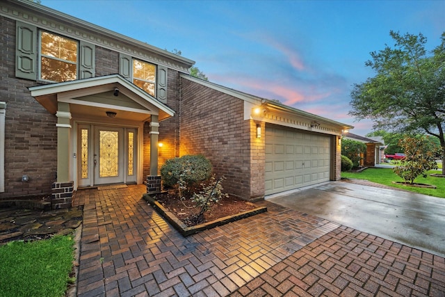 1510 Apple Park Dr, Katy, TX 77450 - view of front of house with an attached garage, concrete driveway, and brick siding