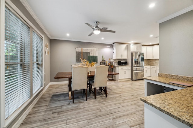 1510 Apple Park Dr, Katy, TX 77450 - dining space featuring ornamental molding, a ceiling fan, recessed lighting, light wood-style floors, and baseboards