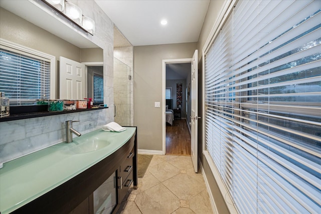 1510 Apple Park Dr, Katy, TX 77450 - full bath with ensuite bathroom, vanity, tile patterned flooring, and baseboards
