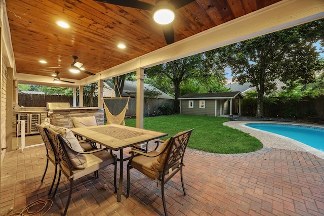 1510 Apple Park Dr, Katy, TX 77450 - view of patio / terrace with outdoor dining area, an outdoor structure, and ceiling fan