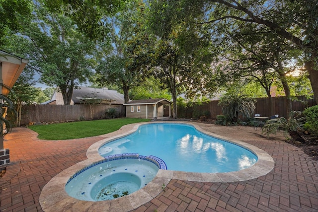 1510 Apple Park Dr, Katy, TX 77450 - view of swimming pool featuring a pool with connected hot tub and a patio