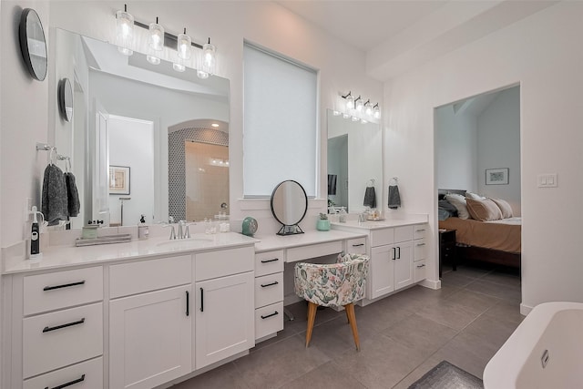 29118 Sage Trace Ct, Fulshear, TX 77441 - ensuite bathroom featuring tiled shower, vanity, tile patterned flooring, and a soaking tub