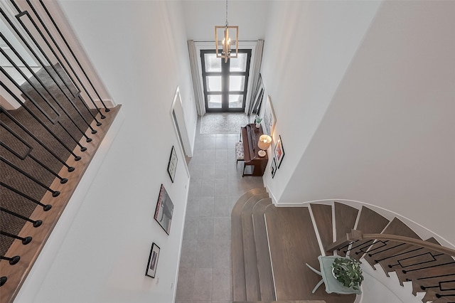 29118 Sage Trace Ct, Fulshear, TX 77441 - staircase with a chandelier and tile patterned flooring