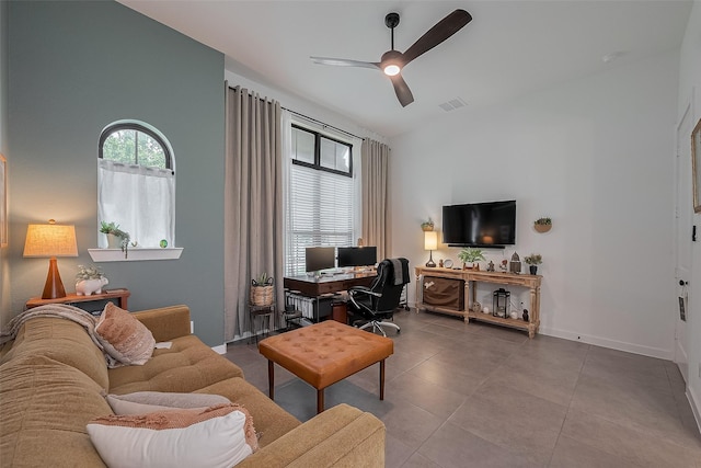 29118 Sage Trace Ct, Fulshear, TX 77441 - tiled living room featuring ceiling fan, baseboards, and an office area