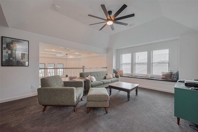 29118 Sage Trace Ct, Fulshear, TX 77441 - living area featuring a ceiling fan, healthy amount of natural light, dark colored carpet, baseboards, and lofted ceiling