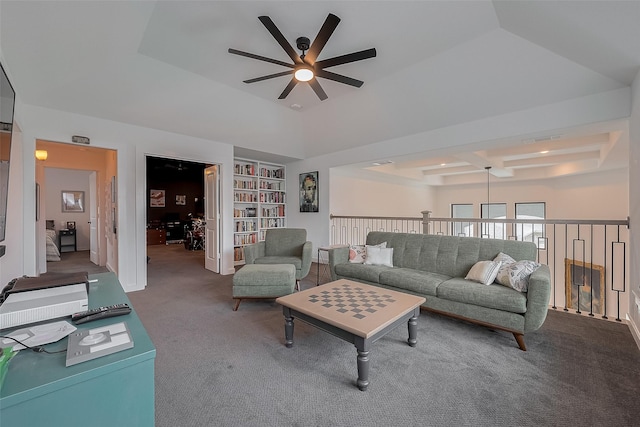 29118 Sage Trace Ct, Fulshear, TX 77441 - living area featuring ceiling fan, carpet, built in features, and a tray ceiling