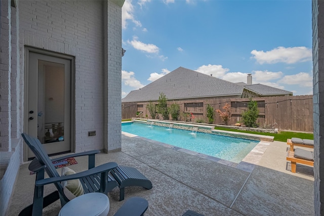 29118 Sage Trace Ct, Fulshear, TX 77441 - view of swimming pool with a patio area, a fenced backyard, and a hot tub