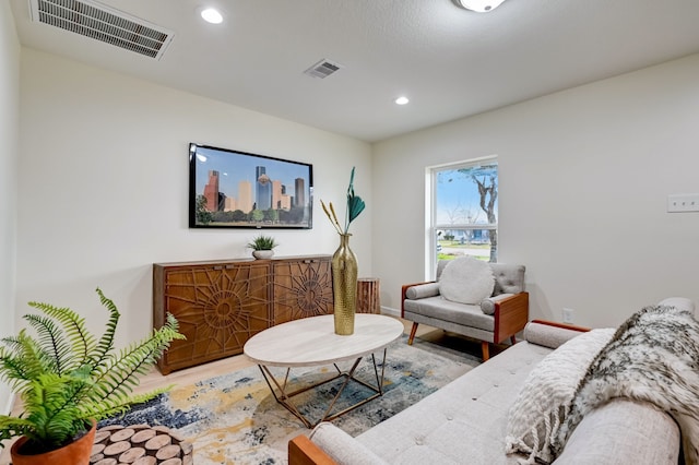 104 18th Ave N, Texas City, TX 77590 - living area with wood finished floors, recessed lighting, and baseboards