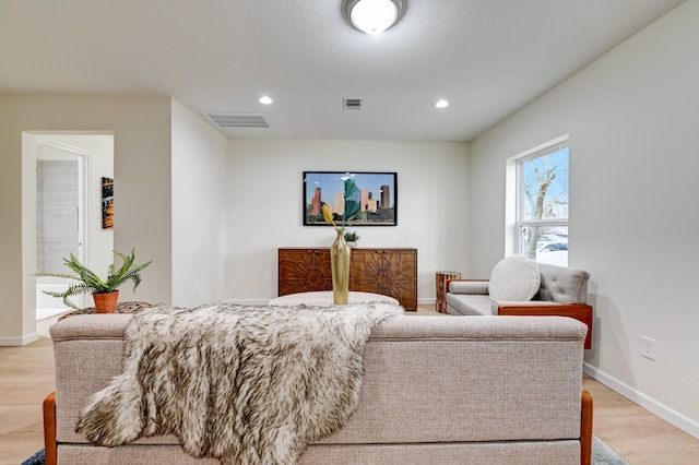104 18th Ave N, Texas City, TX 77590 - living room with light wood-style floors, recessed lighting, and baseboards