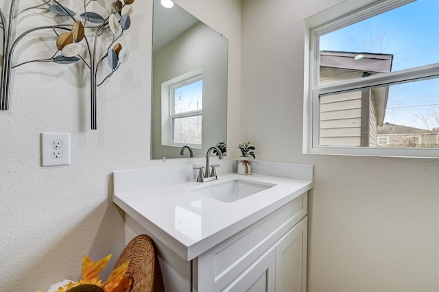104 18th Ave N, Texas City, TX 77590 - bathroom with vanity and a textured wall