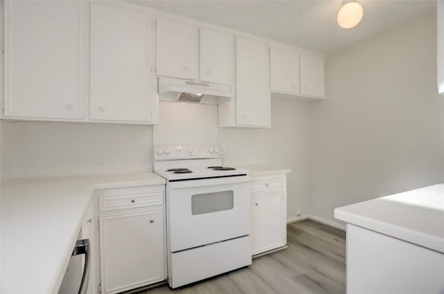 8718 Maplecrest Dr, Houston, TX 77099 - kitchen with under cabinet range hood, white electric stove, light wood-style flooring, white cabinetry, and light countertops