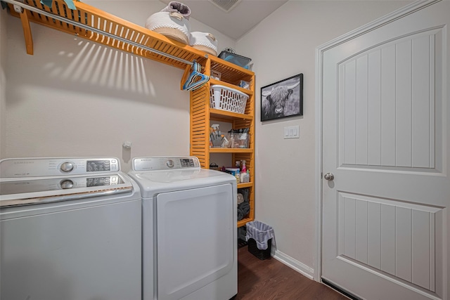 308 Morning Dove Trl, Sealy, TX 77474 - washroom featuring washing machine and clothes dryer, dark wood finished floors, and baseboards