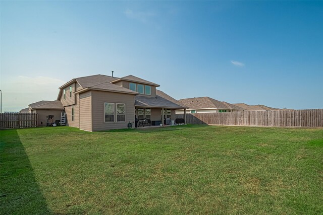 308 Morning Dove Trl, Sealy, TX 77474 - rear view of house featuring a patio area
