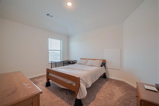 308 Morning Dove Trl, Sealy, TX 77474 - bedroom with carpet flooring, baseboards, and lofted ceiling