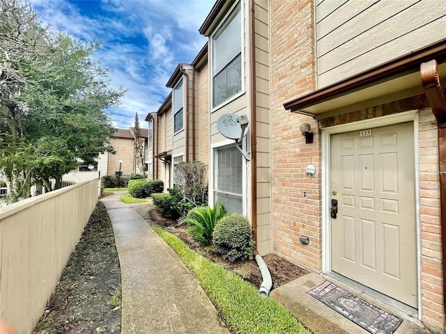 2100 Wilcrest Dr Unit 123, Houston, TX 77042 - entrance to property with brick siding