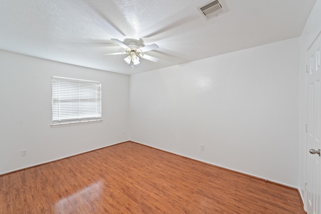 13911 Fraser Lake Ln, Houston, TX 77083 - unfurnished room featuring ceiling fan, wood finished floors, and baseboards
