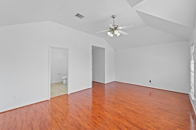 13911 Fraser Lake Ln, Houston, TX 77083 - unfurnished room featuring vaulted ceiling, a ceiling fan, and wood finished floors