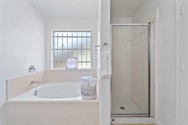 13911 Fraser Lake Ln, Houston, TX 77083 - bathroom with a shower stall and a garden tub