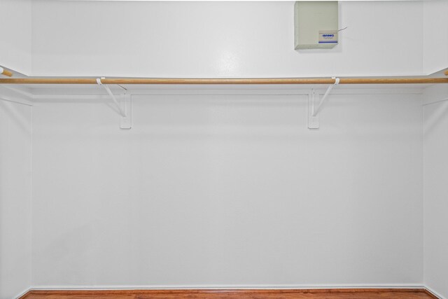 13911 Fraser Lake Ln, Houston, TX 77083 - walk in closet with wood finished floors