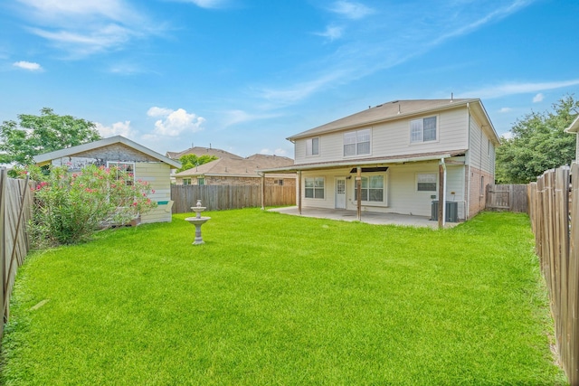 13911 Fraser Lake Ln, Houston, TX 77083 - rear view of property featuring a patio and central AC